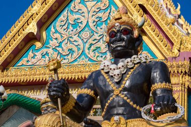 statue of Yommaraj, Lord of Death, at Wat Khao Rang, Phuket, Thailand