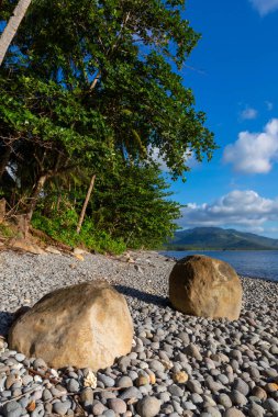 Rocks resting on pebbled beach, Philippines Southern Leyte