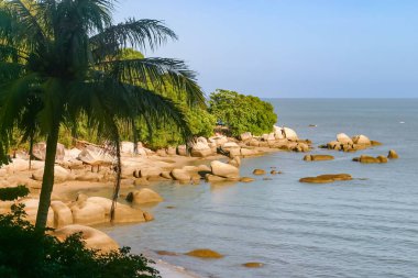 Tropical beach landscape with large rock formations, Malaysia