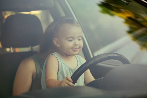 Child Sitting Mother Knees Car Turning Steering Wheel Little Cute — Stock Photo, Image