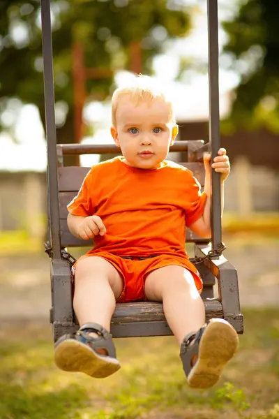 Cute Little Blond Boy Sitting Swing Park Leisure Child Nature — Stock Photo, Image