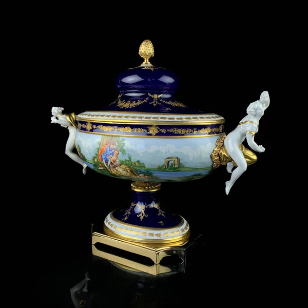 antique flower vase with Dutch painting. antique English porcelain. art painting of dishes. renaissance vase