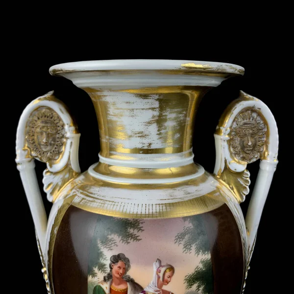 antique renaissance amphora on a black isolated background. amphora with Dutch painting. English porcelain