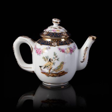 vintage teapot with floral pattern. retro teapot. coffee service. vintage porcelain teapot