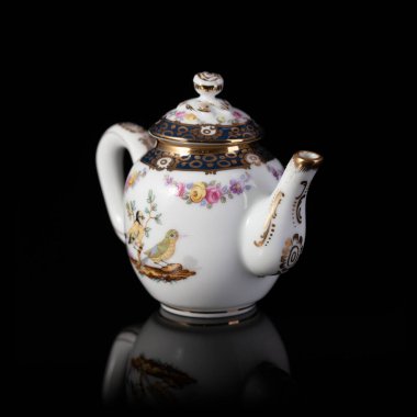 vintage teapot with floral pattern. retro teapot. coffee service. vintage porcelain teapot