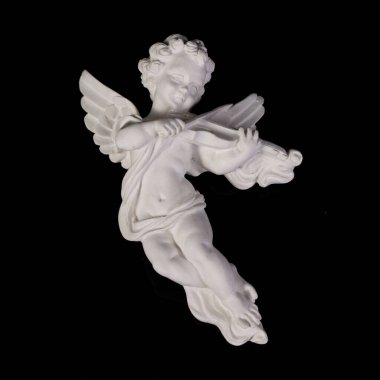 Angel figurine isolated on black background. Cupid with bow and arrow. Antique porcelain cupid figurine close-up