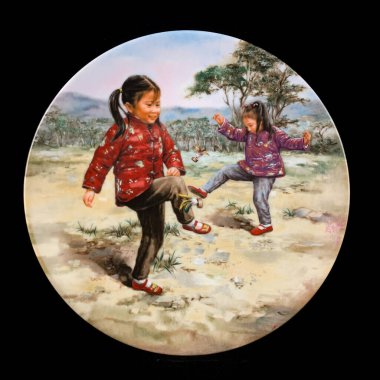 Children's drawing on a black background. The image of a girl in a hat and a boy in a yellow dress. Round picture for decoupage