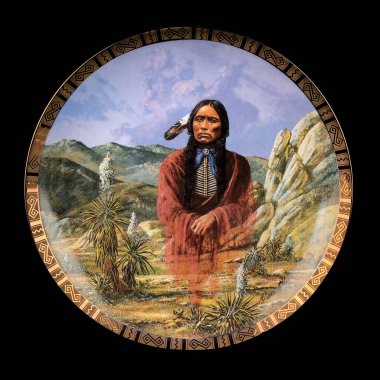 Native american indian chief on a round plate isolated on black. Round picture for decoupage.