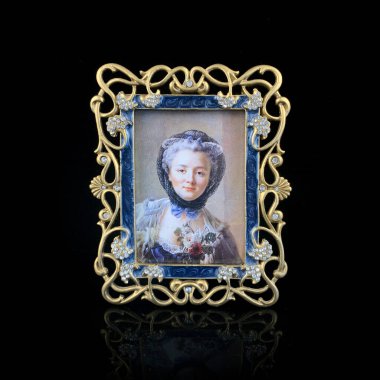Vintage frame with floral ornament on black background. Handmade. antique photo frame with a frame of flowers