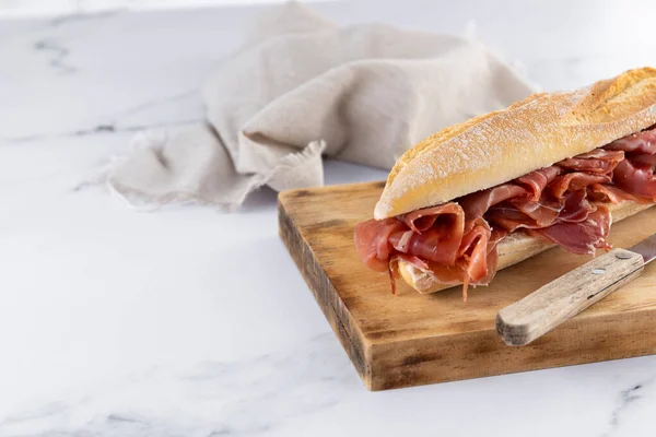 Spanish Serrano Ham Sandwich Marble Background Copy Space — Stock Photo, Image