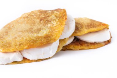 Traditional Venezuelan beef cachapa isolated on white background