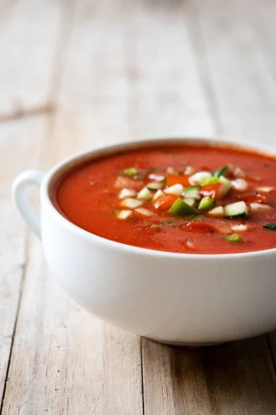 stock image Traditional Spanish gazpacho soup in bowl on wooden table. Close up