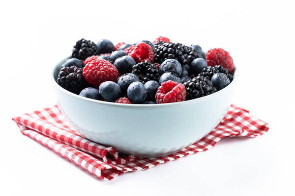 Fresh assortment berries isolated on white background