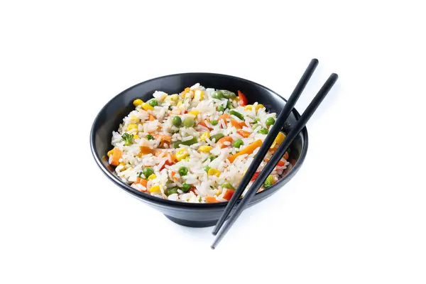 白色炒饭 蔬菜放在黑色碗中 背景为白色 图库照片