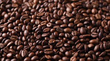  Dönen kavrulmuş kahve çekirdeği arka planı
