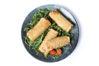 Çıtır çıtır sebzeler. Beyaz arka planda Rolls Royce.