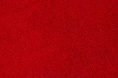 Doğal kırmızı boyanmış deri, süet makro fotoğraf. Kırmızı süet dokusu.