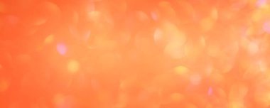 Görüntü, bokeh. Açık arkaplan uyarı pankartı sarı ve pembe ile turuncu.