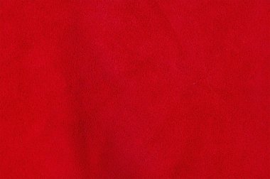 Kırmızı süet arka plan. Kırmızı arkaplanın ince odak noktası.