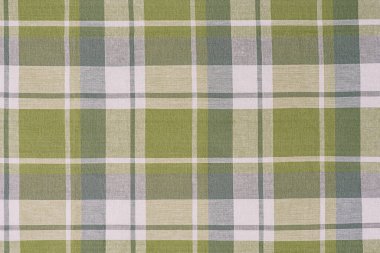 Arkaplan olarak yeşil ve beyaz kareli kumaş