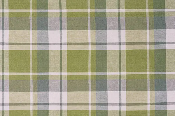 Arkaplan olarak yeşil ve beyaz kareli kumaş