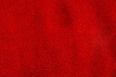 Kırmızı süet, arka plan olarak kırmızı boyanmış deri.