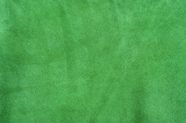 Süetin dokusu yeşil renklidir. Doğal deri dokusu..