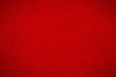 Kenarları koyu kırmızı süet. Arka plan olarak süet makro