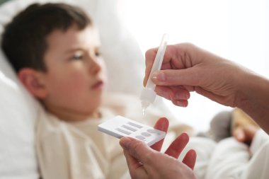 A little boy is sick, a combo antigen test (covid-19, flu a b, RSV) is needed for proper diagnosis.