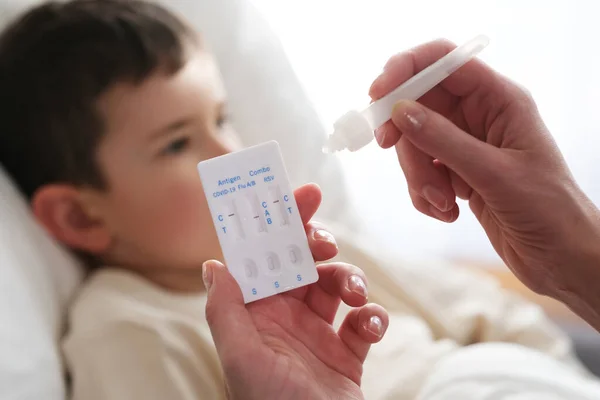 Little Boy Sick Combo Antigen Test Covid Flu Rsv Needed — Stockfoto