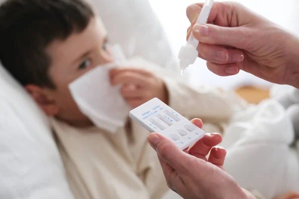 Little Boy Sick Combo Antigen Test Covid Flu Rsv Needed —  Fotos de Stock