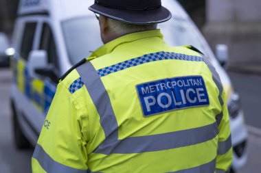 London, UK 14 January 2024. Police patrol in front of Buckingham Palace. clipart