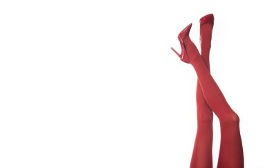 İzole edilmiş beyaz arka planda kırmızı taytlar ve yüksek topuklar..