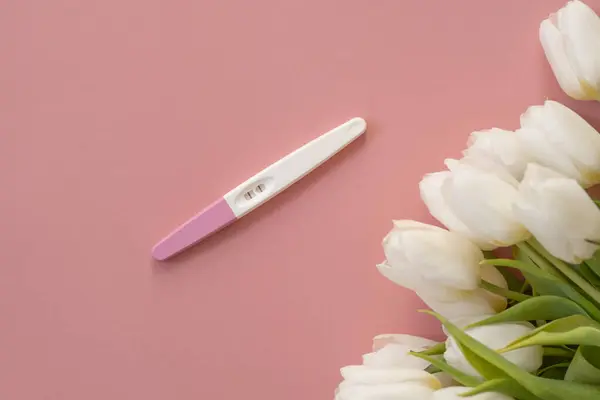 Positive Pregnancy Test Woman Hand Pastel Pink Background — Stock Photo, Image