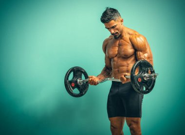 Handsome Muscular Man lifting weights