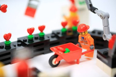 Hong Kong - January 27 2023: worker are working hard in the love factory with the production line