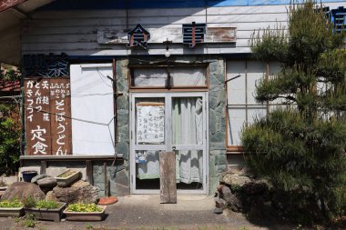 Kinugawa, Japan - 3 May 2023: the closed restaurant in the village of Kinugawa Onsen. Japan experienced the Covid, as well as the rural depopulation and aging population which make economics worst. clipart