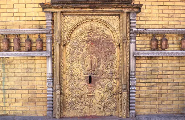 stock image the golden gate in eye of buddha on the Swayambhunath or So called Monkey temple, this is a historic stupa in Kathmandu. 