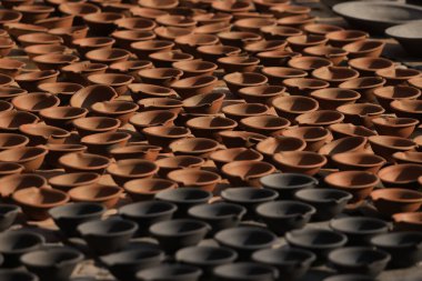 potter is under sun-dried pocessing in the Talako Tole or so called pottery square.