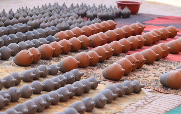 potter is under sun-dried pocessing in the Talako Tole or so called pottery square.
