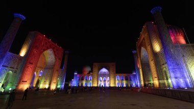 Samarkand, Uzbekistan- September 30 2024:the night show is token place in The Registan, it was the heart of the city of Samarkand of the Timurid Empire, now it becomes the famous tourist spot. clipart