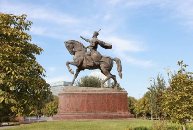 Tashkent, Uzbekistan - October 1 2024: statue of Timur on houseback at amir timur square. one of landmark  clipart