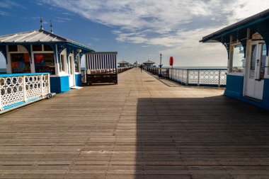 Llandudno, WALES  JUN 20 2022 Llandudno Pier on a sunny summer morning. Llandudno, , Conwy County, North Wales, UK, landscape. clipart