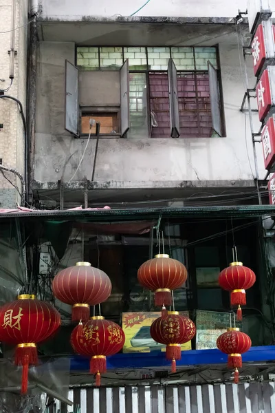 stock image Manila, Philippines, 28 march 2023. Walking in Binondo, Manilas Chinatown, with its tall buildings, and red chinese lanterns.