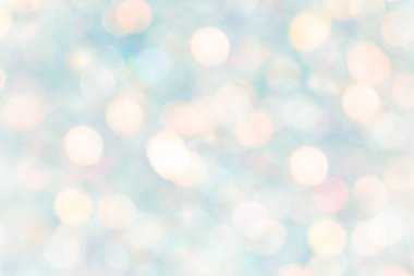 Noel arkaplanı. Bulanık, bulanık, çok renkli, pembe ışıklar. Bir kartpostalın temeli