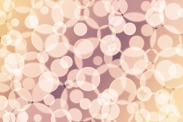 Bright beige bokeh background with abstract defocused circles. Abstract beige background with blurred circles.