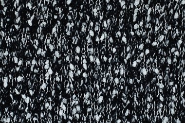 Siyah örülmüş arka plan, beyaz noktalar.