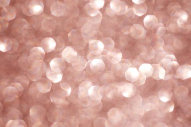 Bulanık soyut Bokeh ışıkları yumuşak pembe renklerde Sakin ve huzurlu bir görüntü yaratıyor