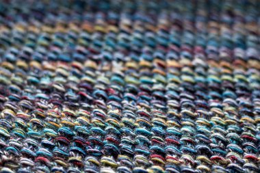 Çok renkli dokuma kumaşının detaylı dokusu yakın çekim kompozisyonu