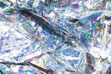 Renkli yanardöner ve dinamik dokuya sahip parlak maddenin yakın çekimi